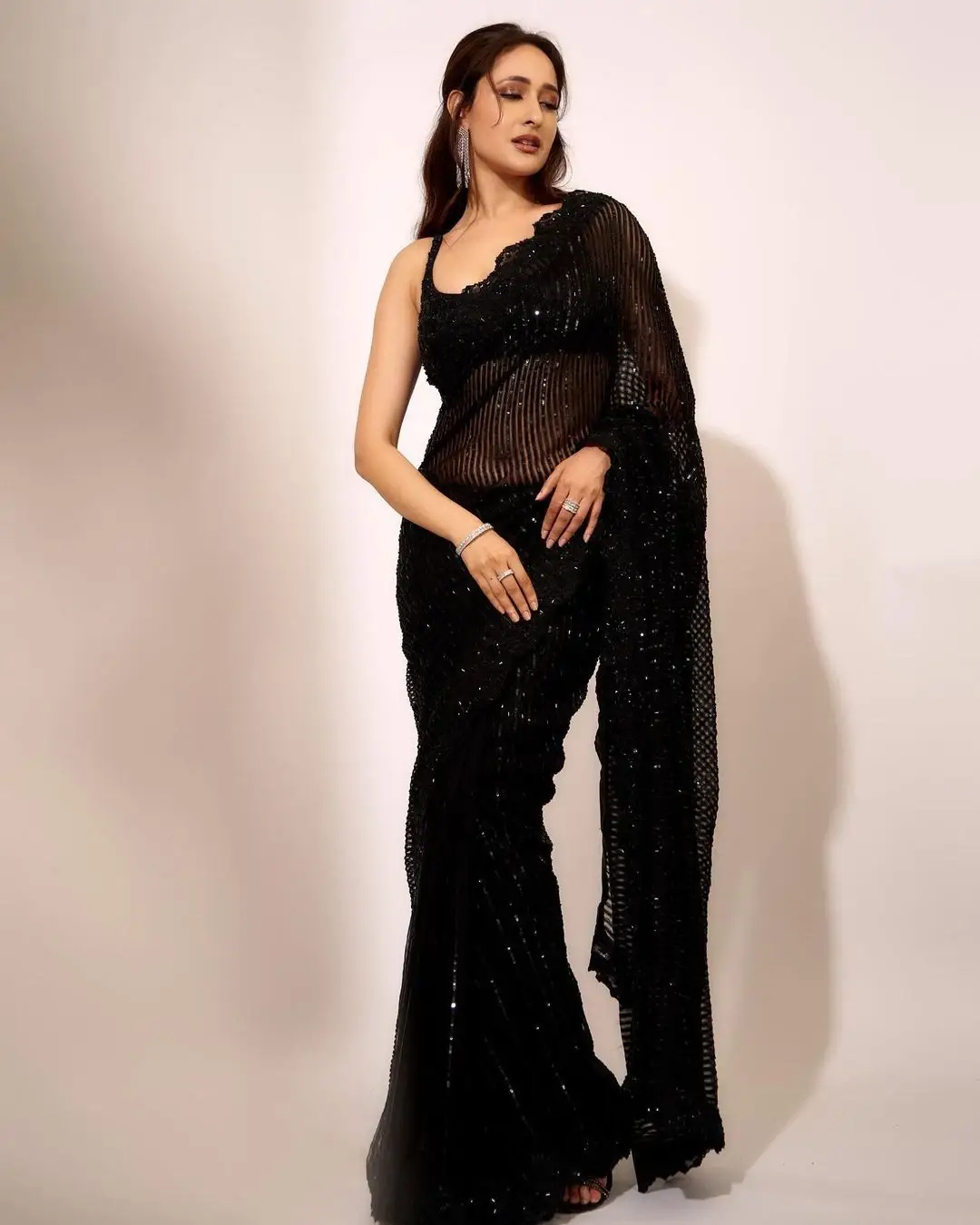 Indian Actress Pragya Jaiswal in Sleeveless Black Saree